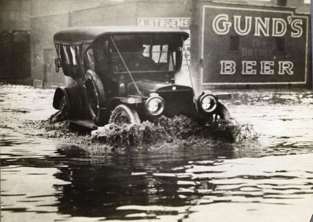 Car Struggling Through  Waterlogged West 3rd Street
